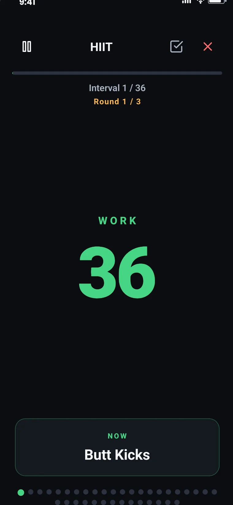 A running FitTrack HIIT session: a full-screen work countdown with round and interval counters.